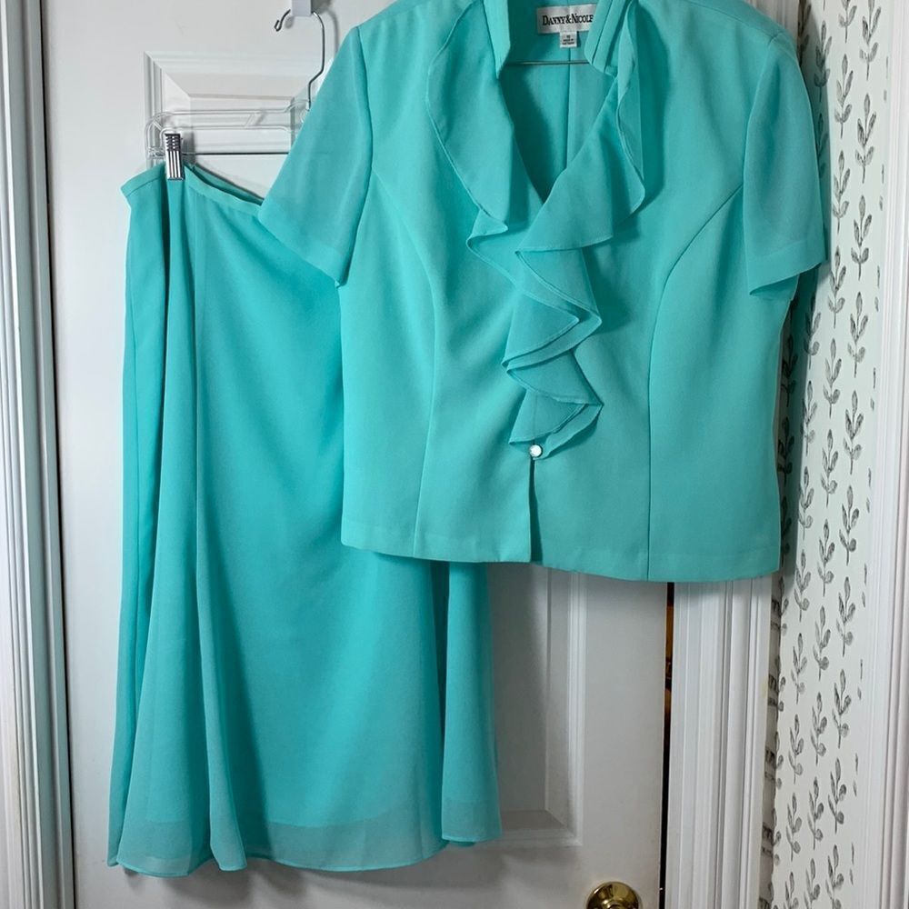 Danny and Nicole size 16 two-piece suit pale blue.  Like new!